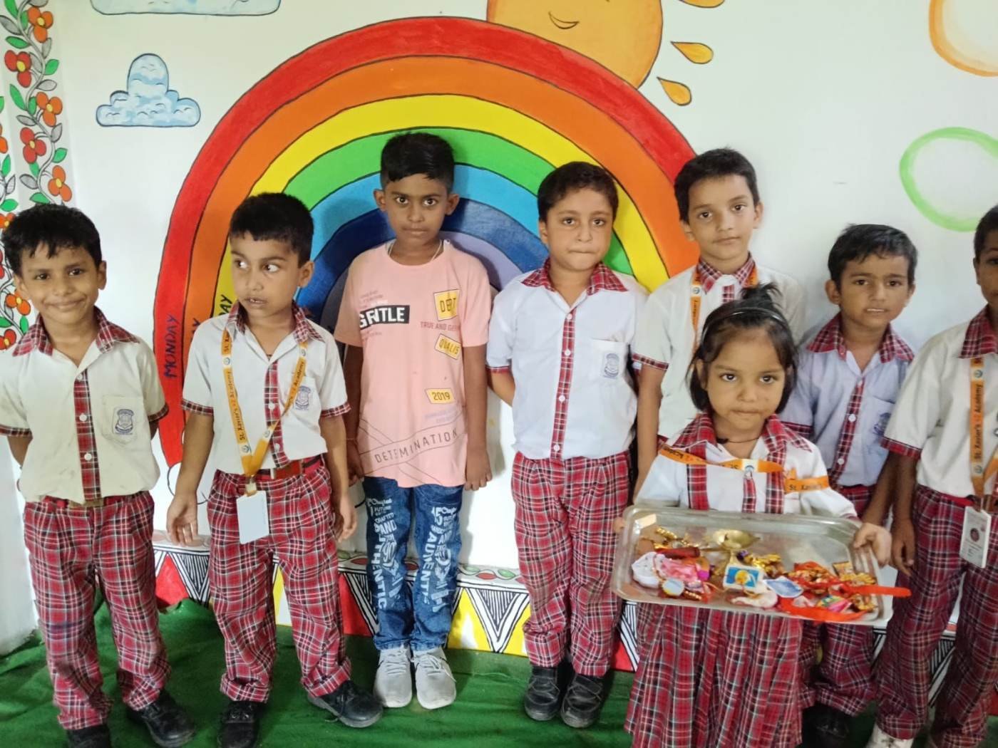Younger students in uniform at St. Xavier's +2 Academy