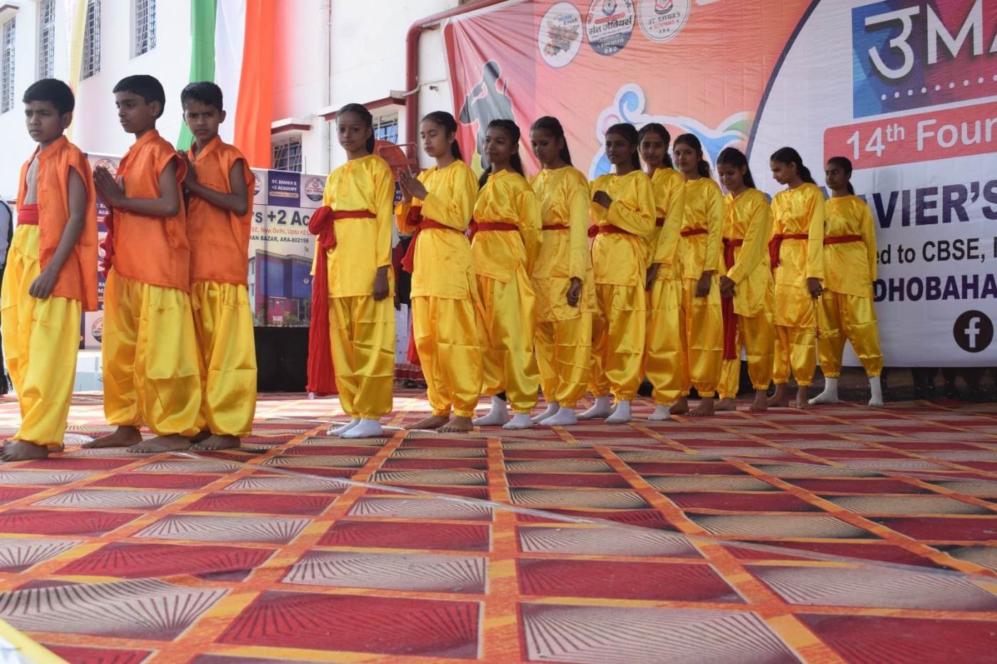 Students in a cultural performance at the school