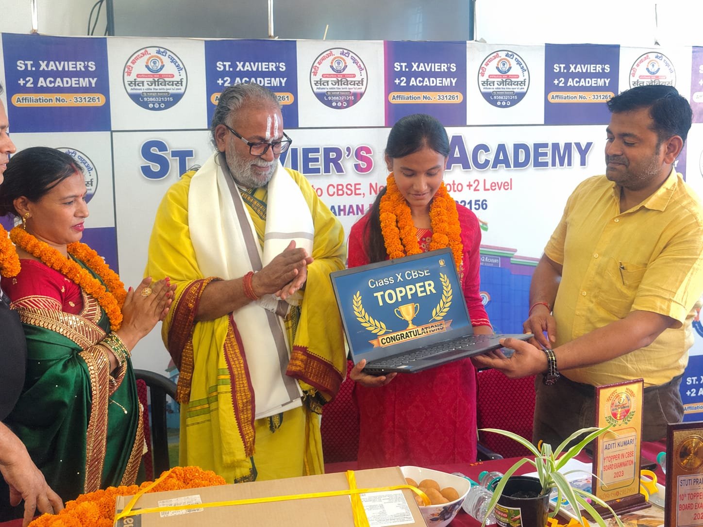 Felicitation of class 10th board students: Laptop award to rank 1 holder